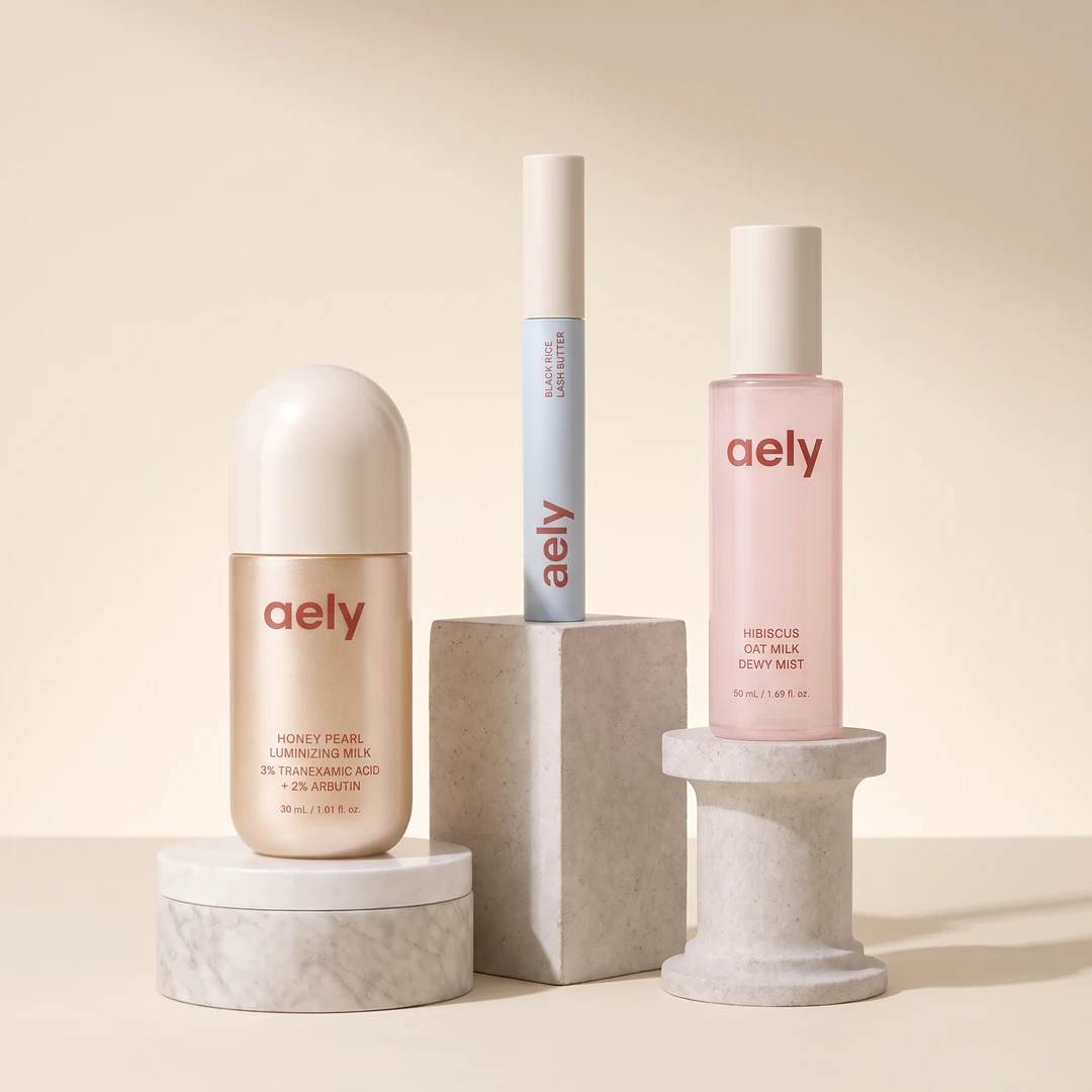 The Ritual Set: all three Aely products grouped on stone plinths, each named on the packaging